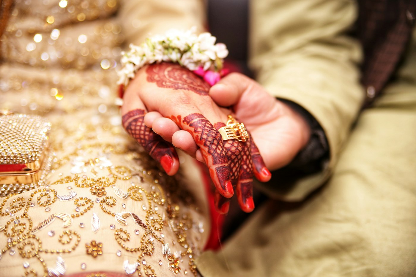 Mehendi hands with a ring and bangles